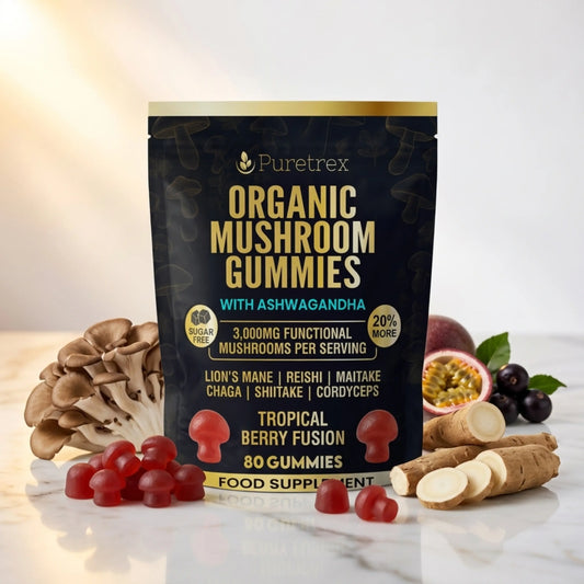 Puretrex Organic Mushroom Gummies pouch shown on a light marble surface with mushrooms, ginger, berries, and gummies arranged around it. The package is black with gold and teal text and a gold top band.