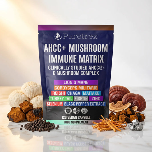 PURETREX AHCC Mushroom Matrix food supplement front pouch shown on a white marble surface with dried mushrooms, seeds and natural botanical ingredients, multi-mushroom blend in premium packaging