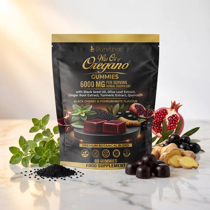 Puretrex Wai Ole of Oregano Gummies pouch shown on a light marble surface with black seed oil, pomegranate, ginger, and gummies arranged around it.